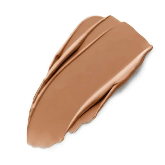 Warm yellow full-coverage concealer swatch on white background, showcasing smooth texture and even tone for radiant complexion.